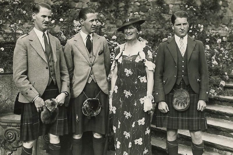 Historic photograph of Lady Rachel MacRobert with her sons wearing kilts