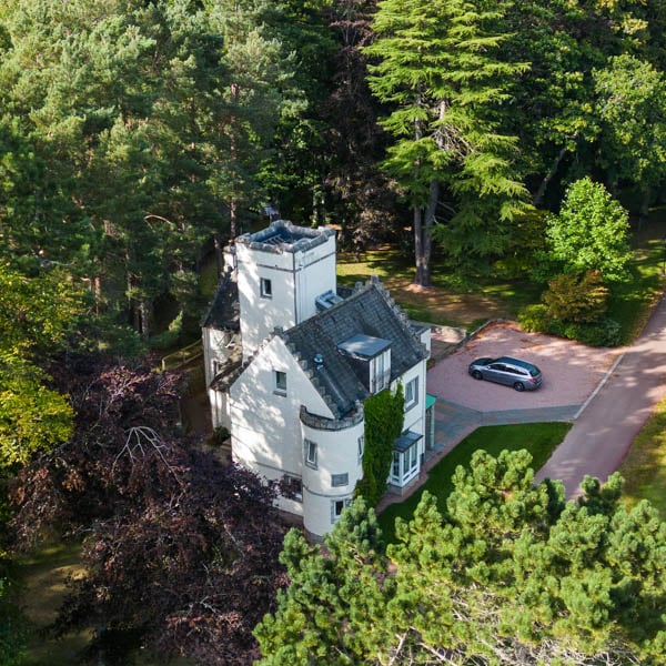 Aerial view of the Casa Memoria apartments and surrounding trees at Douneside House