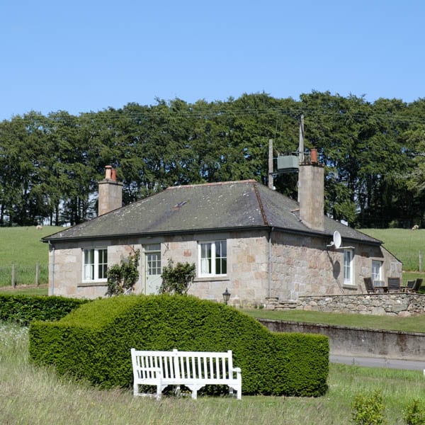 Exterior of Alpha Cottage within the grounds of Douneside House
