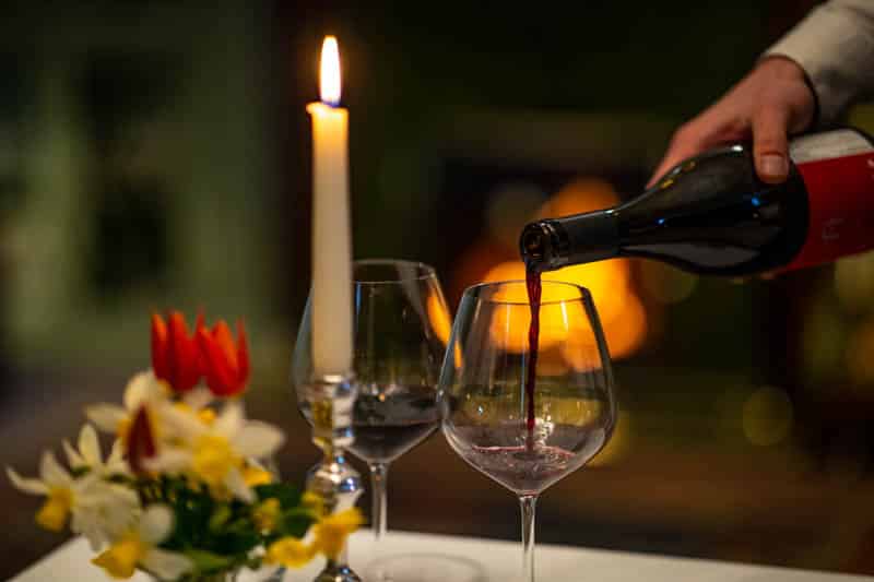 Wine being poured with Dinner in the Library restaurant at Douneside