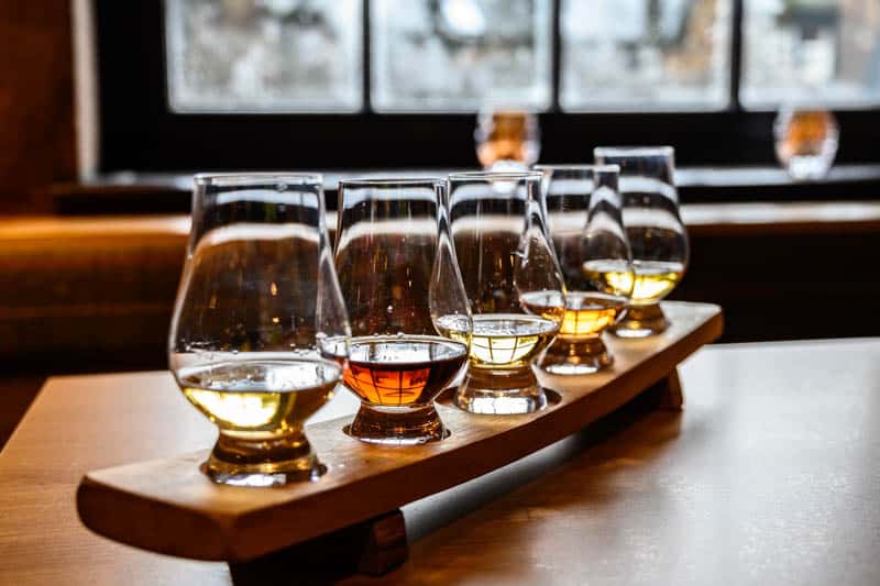 Flight of Scottish whisky, tasting glasses with variety of singl