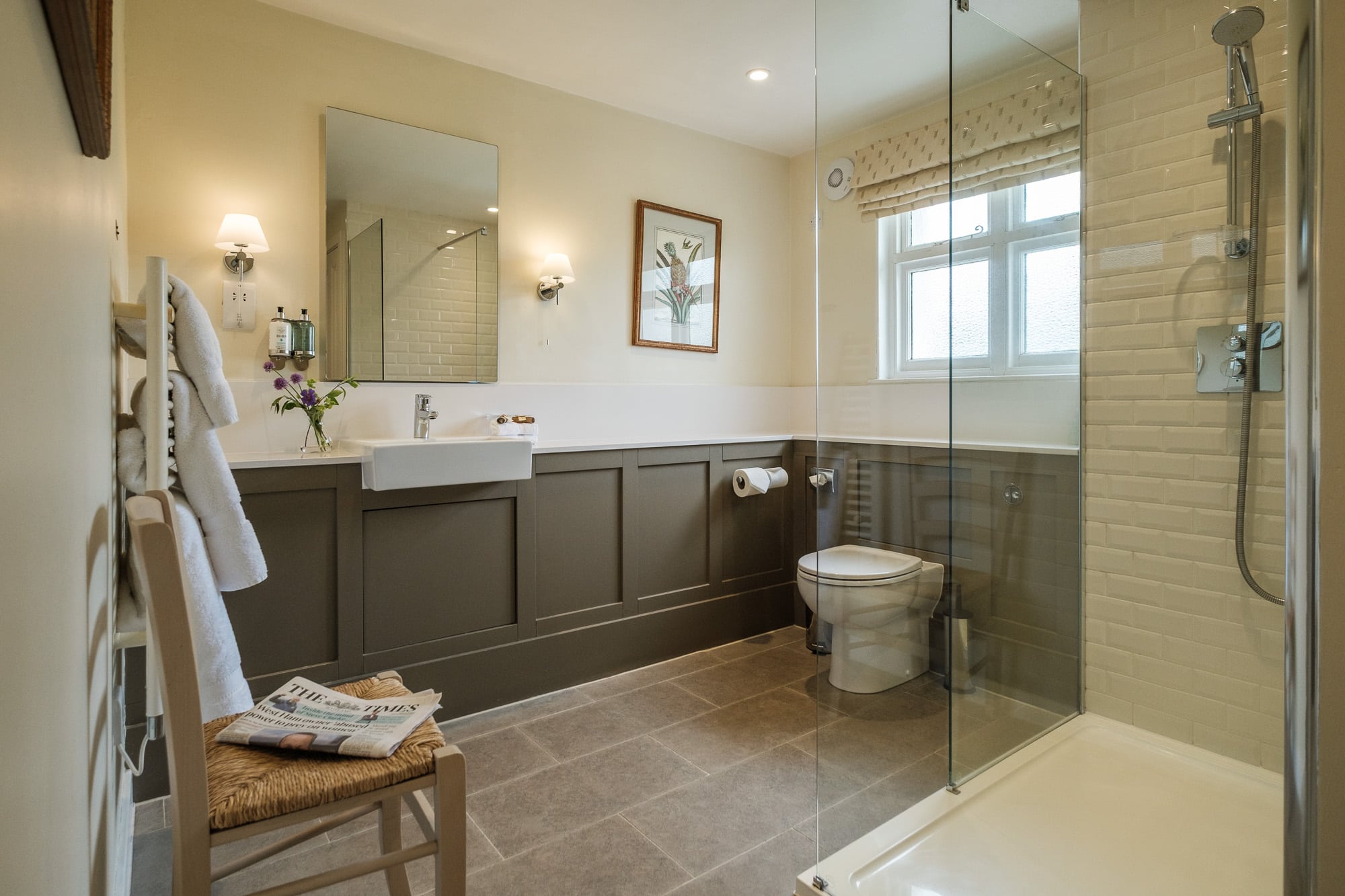 Bathroom_Dounebrae_Cottage Bathroom in Dounebrae Cottage with walk-in glass shower, vessel basin and metro tiles at Douneside House