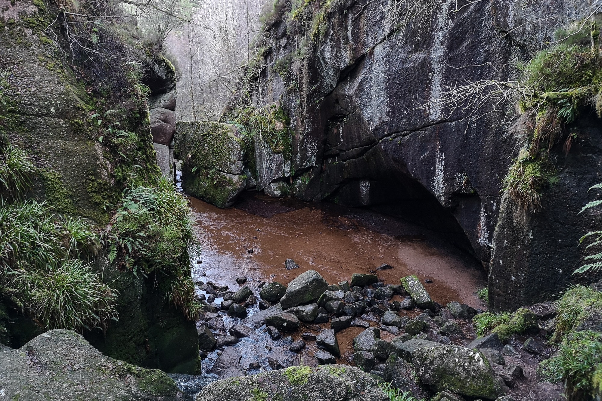 Burn O'Vat Burn O'Vat, a dramatic natural granite cauldron and gorge in Muir of Dinnet National Nature Reserve, Royal Deeside, Aberdeenshire.