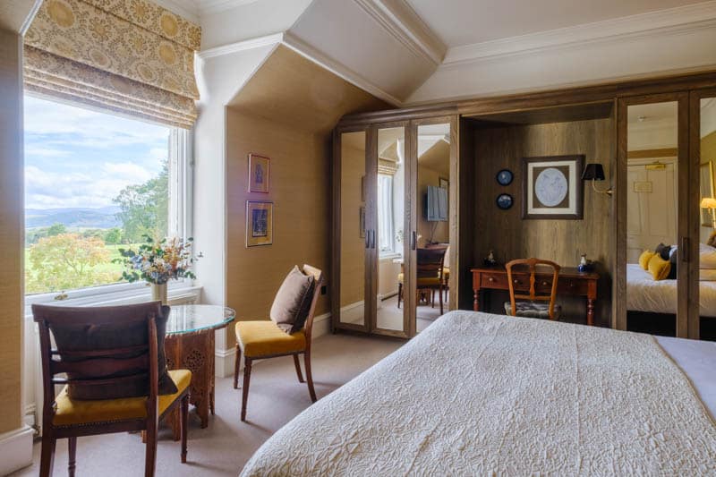 Deluxe bedroom at Douneside House Deluxe bedroom with views over the gardens and infinity lawn at Douneside House