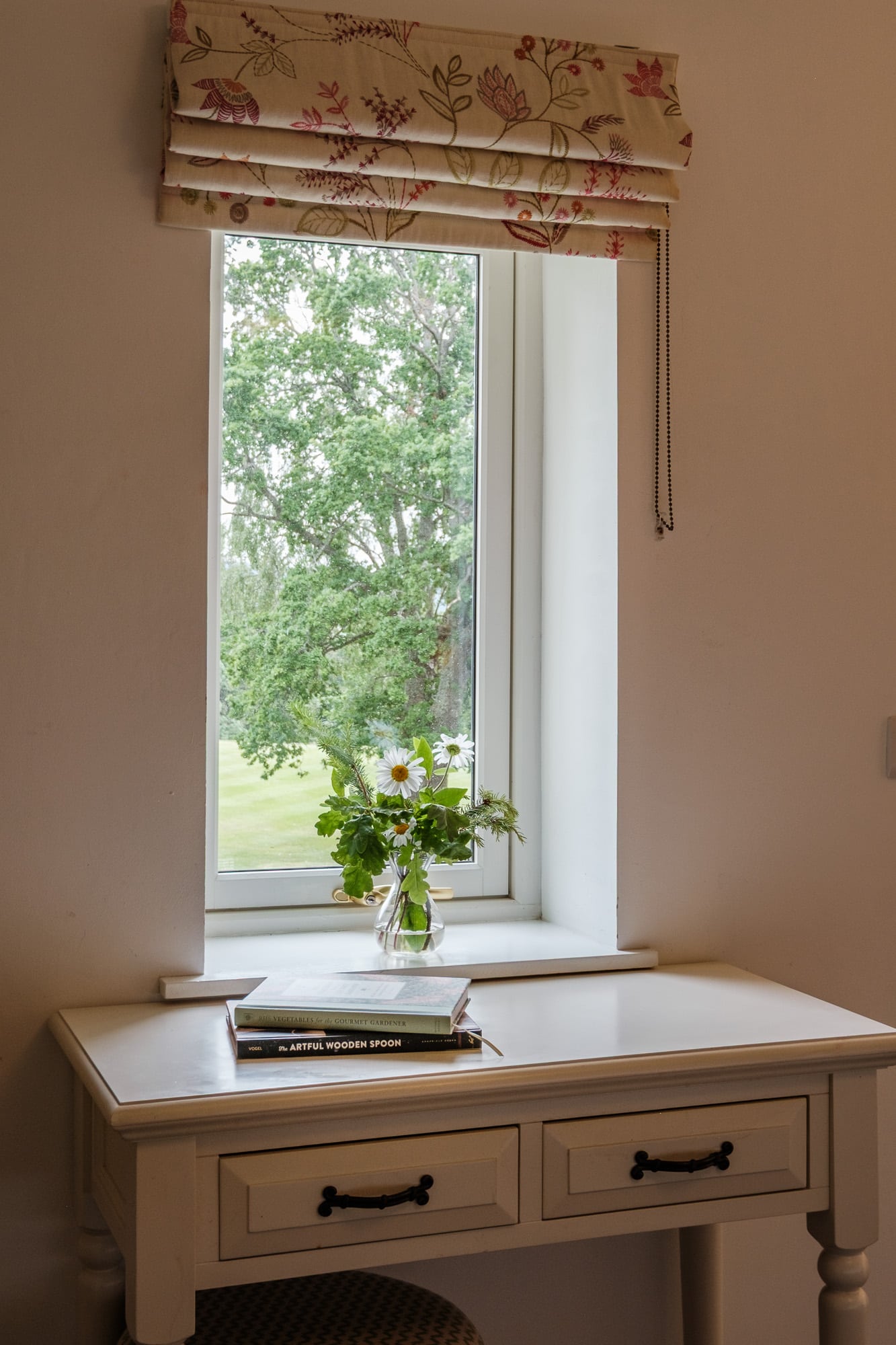 Dresser and window casa21 Casa 21 bedroom detail with white dresser, wildflowers and garden view at Douneside House