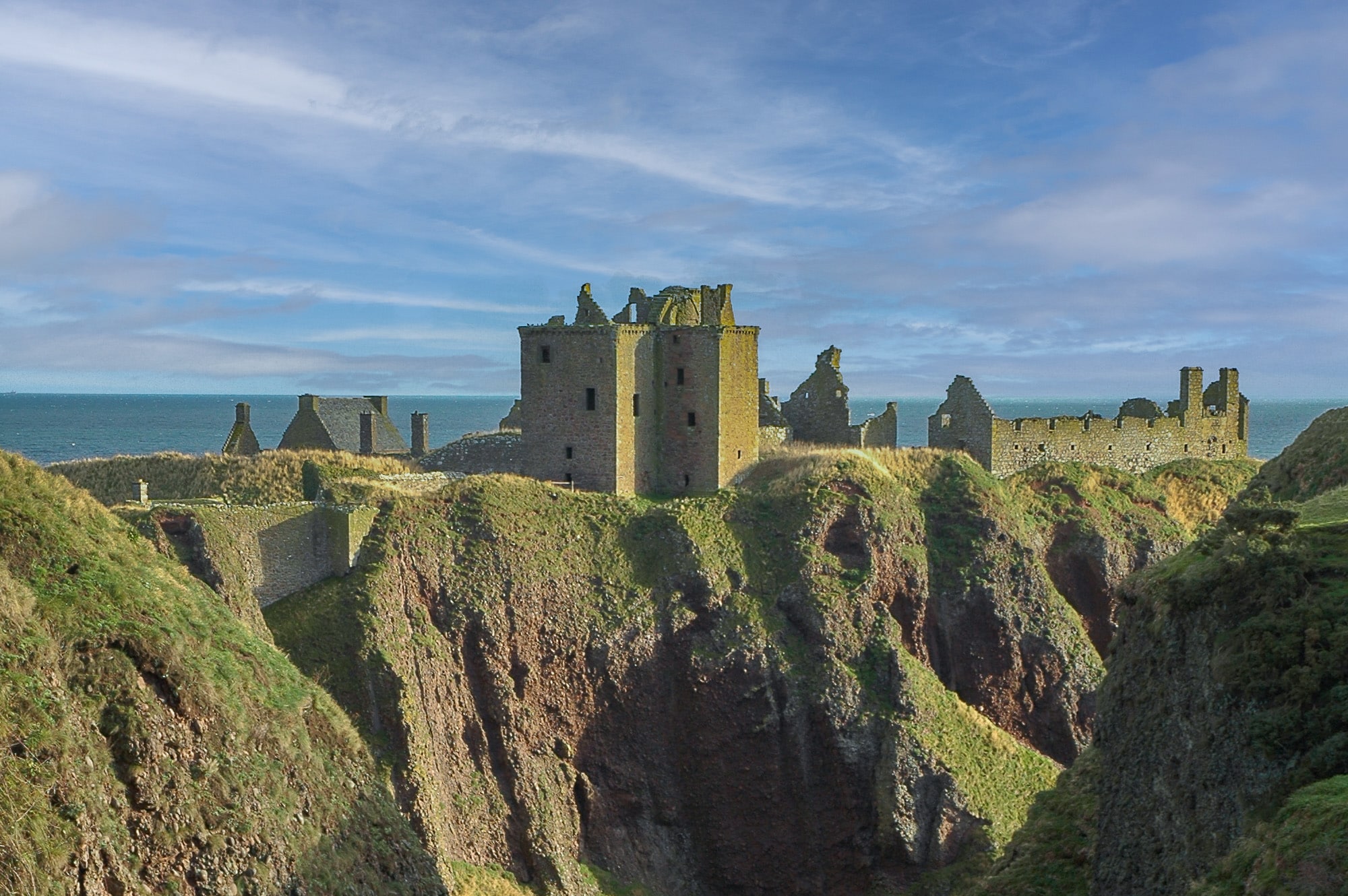 Dunnottar Castle perched on dramatic cliffs above the North Sea near Stonehaven, Aberdeenshire