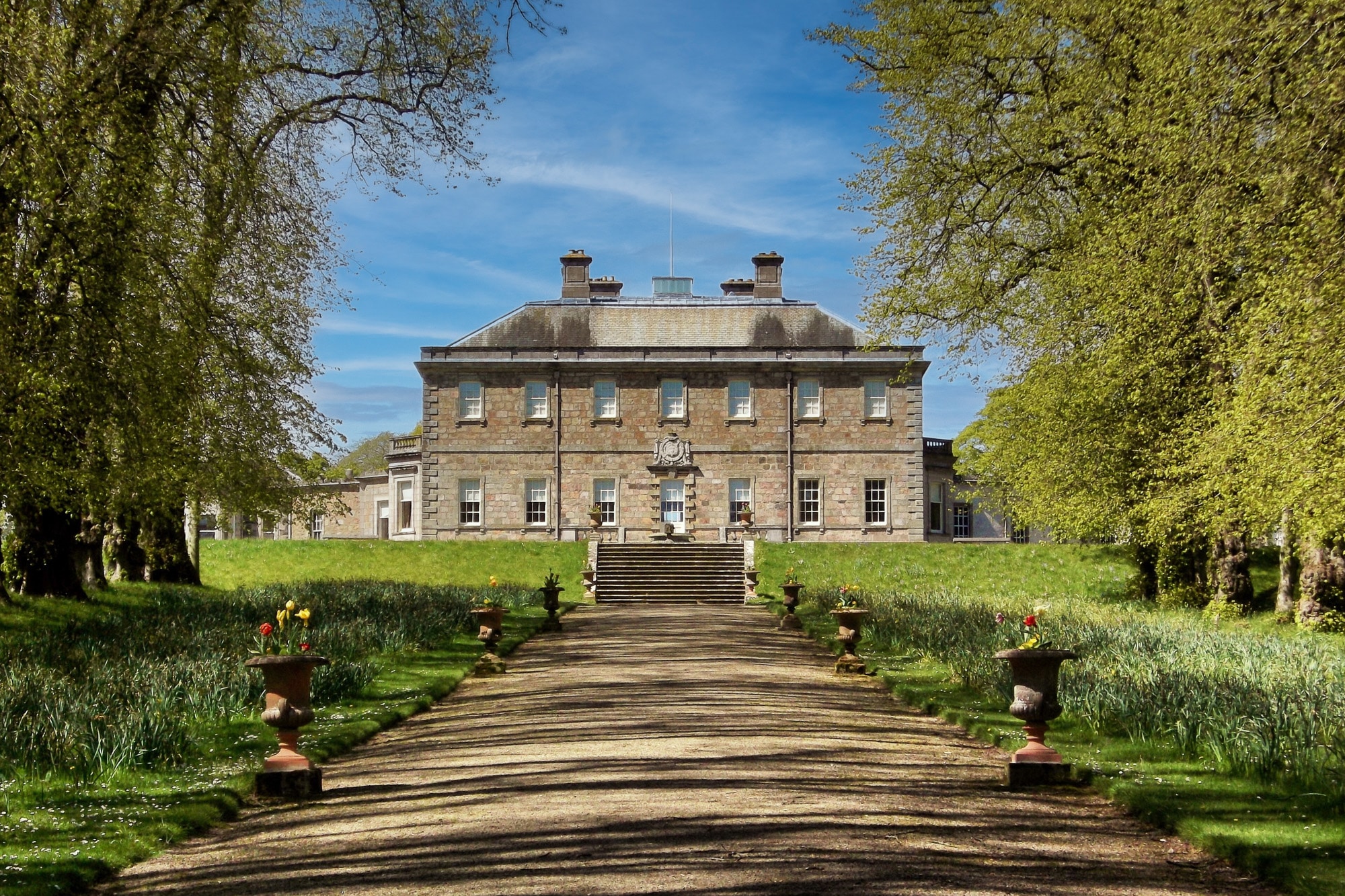 View up the drive at Haddo House in the summer