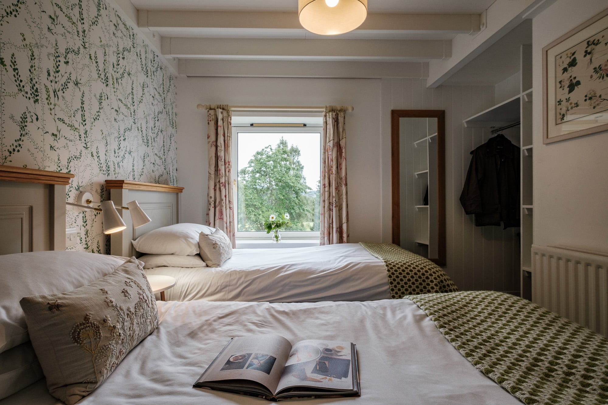 Twin_Bedroom_Casa_21 Twin bedroom in Casa 21 with botanical wallpaper, exposed beams and open wardrobe at Douneside House