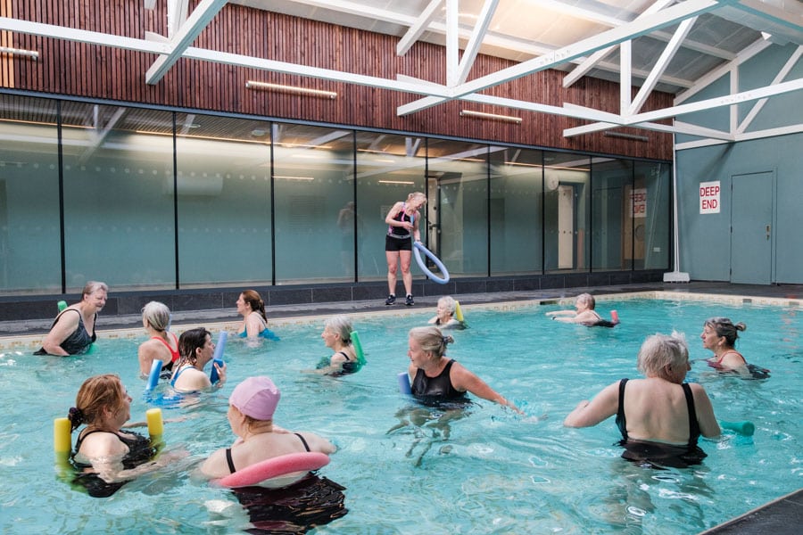 Group taking part in an aqua fitness class in the indoor swimming pool at Douneside Health Club